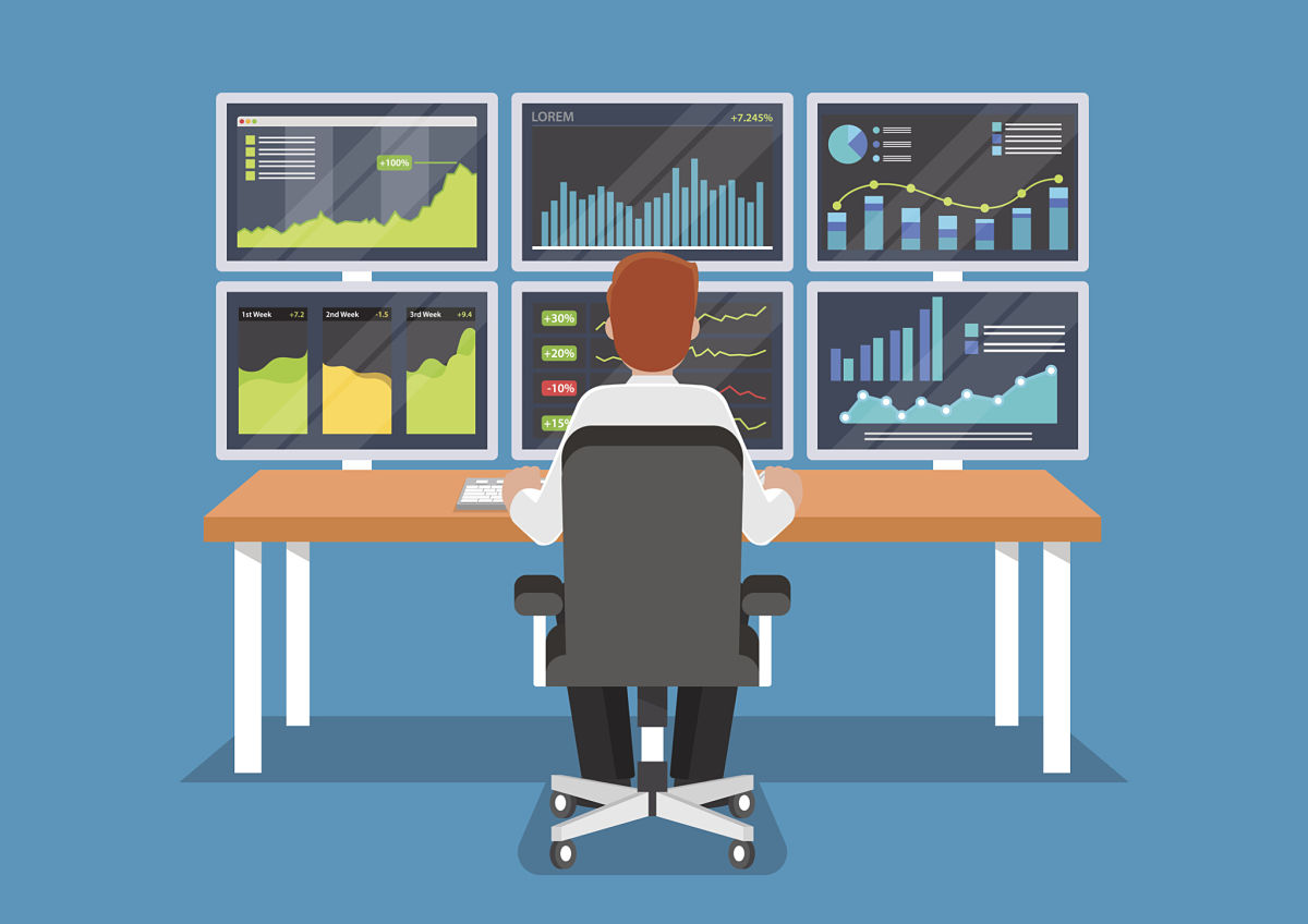 businessman or stock market trader working at desk. businessman or stock market trader working at desk.